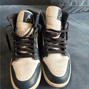 Jordan’s Teal & White Mid’s Sneakers